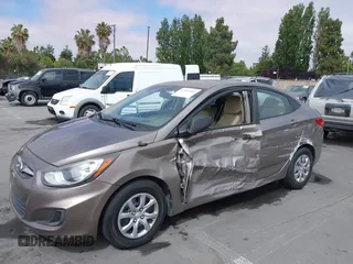 2014 Hyundai Accent GLS z VIN KMHCT4AE4EU758926, wystawiony jako IAAI lot #42451816 z przebiegiem 80 387 mil mil oraz . Historia ofert i sprzedaży dostępna na DreamBid. Obrazek 6.