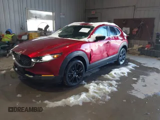 2022 Mazda CX-30 2.5 Turbo with VIN 3MVDMBAY5NM427943, listed as a IAAI auction lot 41585519 with 32,807 mi miles and . Bid and sale history available at DreamBid. Image 17.