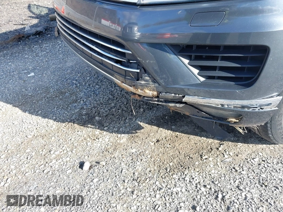 2016 Volkswagen Touareg Sport with VIN WVGEF9BP2GD005315, listed as a IAAI auction lot 41588590 with 134,709 mi miles and . Bid and sale history available at DreamBid. Image 6.