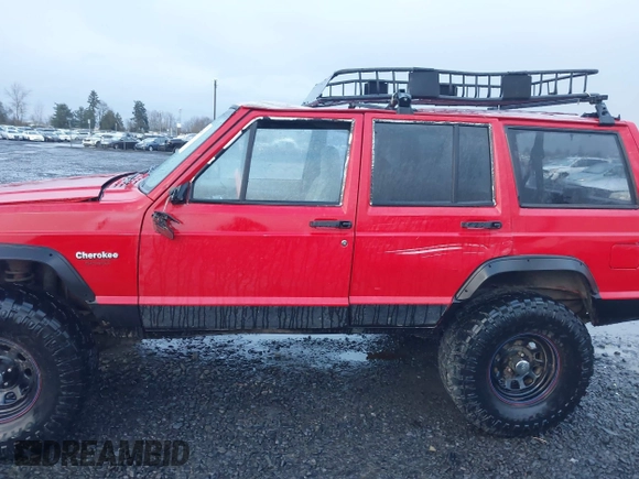 1996 Jeep Cherokee Sport with VIN 1J4FJ68S4TL244893, listed as a IAAI auction lot 41190369 with 192,459 mi miles and . Bid and sale history available at DreamBid. Image 6.