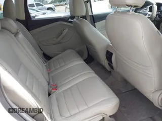2013 Ford Escape SE with VIN 1FMCU0GX5DUA85464, listed as a IAAI auction lot 42452112 with 158,081 mi miles and . Bid and sale history available at DreamBid. Image 8.