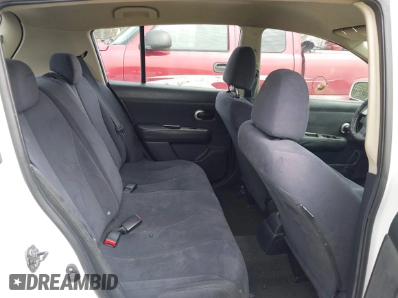 2009 Nissan Versa S with VIN 3N1BC13E39L450242, listed as a IAAI auction lot 42145528 with 239,291 mi miles and . Bid and sale history available at DreamBid. Image 8.