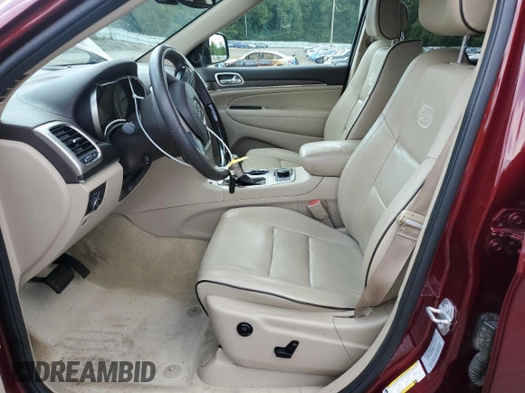 2017 Jeep Grand Cherokee Overland with VIN 1C4RJFCG5HC874130, listed as a Copart auction lot 65324695 with 101,588 mi miles and Salvage title. Bid and sale history available at DreamBid. Image 7.