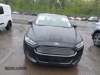 2014 Ford Fusion SE z VIN 3FA6P0H98ER161265, wystawiony jako IAAI lot #42312309 z przebiegiem 141 975 mil mil oraz . Historia ofert i sprzedaży dostępna na DreamBid. Obrazek 12.
