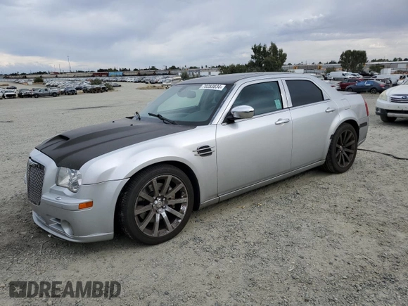 2007 Chrysler 300 C SRT8 with VIN 2C3LA73W07H660214, listed as a Copart auction lot 70283834 with 249,130 mi miles and Salvage Title. Bid and sale history available at carsss.com. Image 1.