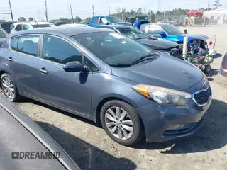 2015 Kia Forte 5-Door EX with VIN KNAFX5A80F5295035, listed as a IAAI auction lot 41797837 with 112,044 mi miles. Bid and sale history available at carsss.com. Image 1.