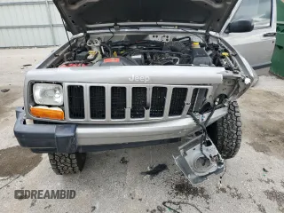 2001 Jeep Cherokee Sport with VIN 1J4FF48S91L592966, listed as a Copart auction lot 58996445 with 159,140 mi miles and Salvage title. Bid and sale history available at DreamBid. Image 12.