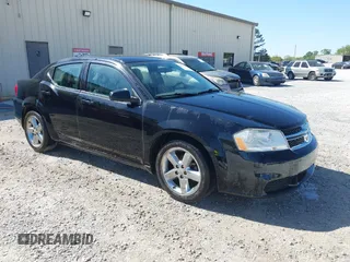 2012 Dodge Avenger SE with VIN 1C3CDZAB5CN237648, listed as a IAAI auction lot 42063514 with 157,123 mi miles. Bid and sale history available at carsss.com. Image 1.