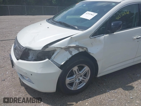 2013 Honda Odyssey Touring with VIN 5FNRL5H9XDB049390, listed as a IAAI auction lot 42532861 with 129,376 mi miles and . Bid and sale history available at DreamBid. Image 6.