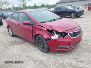 2015 Kia Forte LX with VIN KNAFX4A68F5436703, listed as a IAAI auction lot 42116972 with 146,744 mi miles. Bid and sale history available at carsss.com. Image 1.