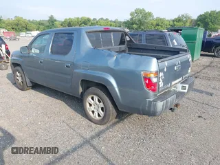 2006 Honda Ridgeline RTL with VIN 2HJYK16526H531884, listed as a IAAI auction lot 42796524 with 334,489 mi miles and . Bid and sale history available at DreamBid. Image 3.