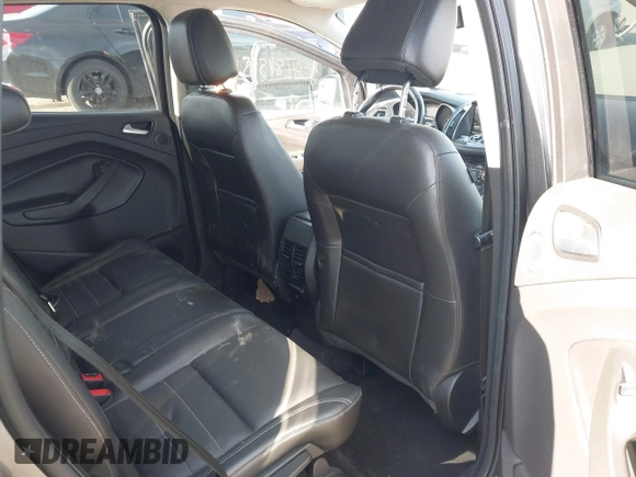 2015 Ford Escape Titanium with VIN 1FMCU9J90FUB58306, listed as a IAAI auction lot 41815151 with 136,835 mi miles. Bid and sale history available at carsss.com. Image 8.