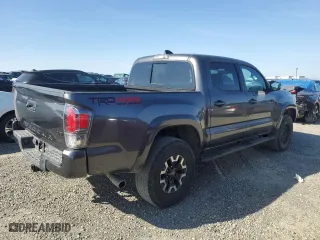 2020 Toyota Tacoma 4WD SR5 with VIN 3TMCZ5AN9LM302379, listed as a Copart auction lot 46530975 with 30,558 mi miles and Salvage Title. Bid and sale history available at carsss.com. Image 3.