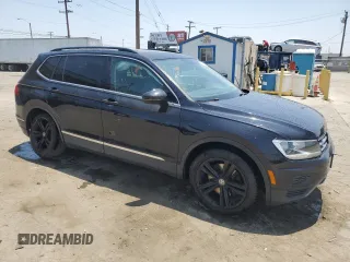 2018 Volkswagen Tiguan SEL with VIN 3VV3B7AX0JM051848, listed as a Copart auction lot 60320655 with 75,141 mi miles and Salvage title. Bid and sale history available at DreamBid. Image 4.