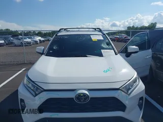 2020 Toyota RAV4 XLE with VIN 2T3W1RFV2LW068363, listed as a IAAI auction lot 42456921 with 125,014 mi miles and . Bid and sale history available at DreamBid. Image 6.