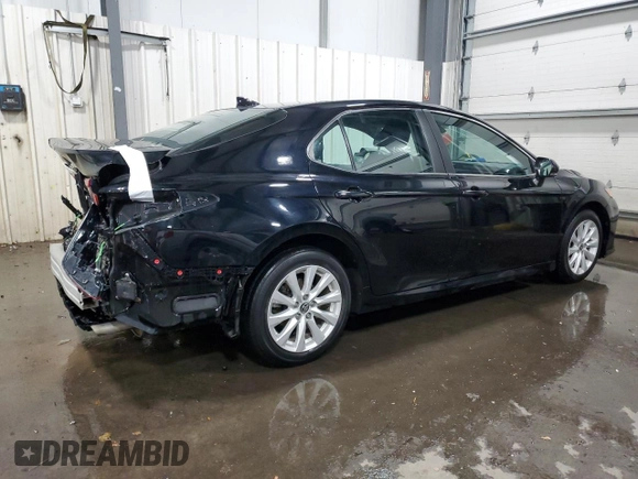 2020 Toyota Camry LE with VIN 4T1L11AK3LU994037, listed as a Copart auction lot 84164204 with 57,363 mi miles and Salvage Title. Bid and sale history available at carsss.com. Image 3.