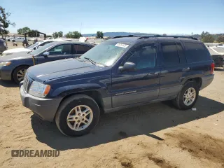 2004 Jeep Grand Cherokee Laredo with VIN 1J4GW48S34C343281, listed as a Copart auction lot 63253325 with 247,697 mi miles and Clean title. Bid and sale history available at DreamBid. Image 1.