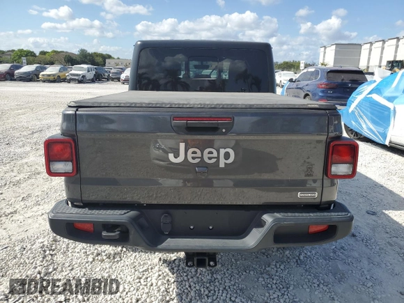 2021 Jeep Gladiator Overland z VIN 1C6HJTFG0ML574762, wystawiony jako Copart lot #54728225 z przebiegiem 32 284 mil mil oraz Szkoda całkowita • Salvage title. Historia ofert i sprzedaży dostępna na DreamBid. Obrazek 6.