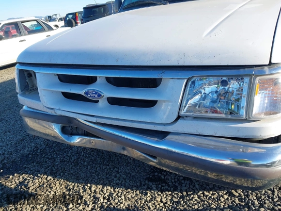 1997 Ford Ranger XLT with VIN 1FTCR10A2VUA40419, listed as a IAAI auction lot 41425447 with 229,314 mi miles. Bid and sale history available at carsss.com. Image 6.