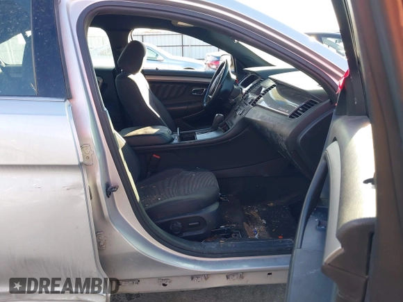 2013 Ford Taurus SEL with VIN 1FAHP2E83DG224780, listed as a IAAI auction lot 41675601 with 166,977 mi miles. Bid and sale history available at carsss.com. Image 5.