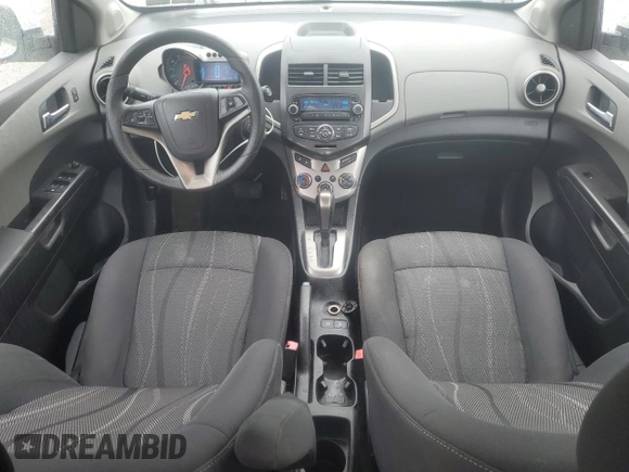 2014 Chevrolet Sonic LT z VIN 1G1JC5SH7E4160011, wystawiony jako Copart lot #57532945 z przebiegiem 136 185 mil mil oraz Szkoda całkowita • Salvage title. Historia ofert i sprzedaży dostępna na DreamBid. Obrazek 8.