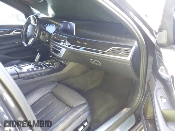 2019 BMW 7 Series 740i with VIN WBA7E2C53KB218375, listed as a IAAI auction lot 42008827 with 61,337 mi miles and . Bid and sale history available at DreamBid. Image 5.