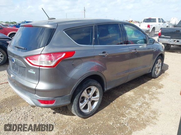 2013 Ford Escape SE with VIN 1FMCU0GX4DUD68468, listed as a IAAI auction lot 42715806 with 95,236 mi miles and . Bid and sale history available at DreamBid. Image 4.