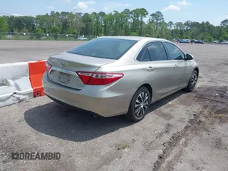 2016 Toyota Camry XLE with VIN 4T1BF1FKXGU259860, listed as a IAAI auction lot 42219507 with 239,145 mi miles and . Bid and sale history available at DreamBid. Image 4.