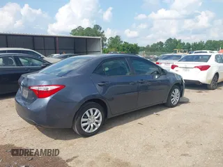 2016 Toyota Corolla L with VIN 5YFBURHE2GP495206, listed as a IAAI auction lot 42382372 with 312,886 mi miles and . Bid and sale history available at DreamBid. Image 4.