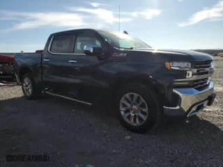 2019 Chevrolet Silverado 1500 LTZ with VIN 3GCUYGED2KG145876, listed as a Copart auction lot 46218695 with 103,132 mi miles and Salvage Title. Bid and sale history available at carsss.com. Image 4.