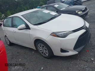 2018 Toyota Corolla L with VIN 5YFBURHE6JP814291, listed as a IAAI auction lot 42372288 with 120,050 mi miles and . Bid and sale history available at DreamBid. Image 1.