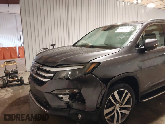 2017 Honda Pilot Touring with VIN 5FNYF6H91HB084737, listed as a IAAI auction lot 41608145 with 86,696 mi miles. Bid and sale history available at carsss.com. Image 6.