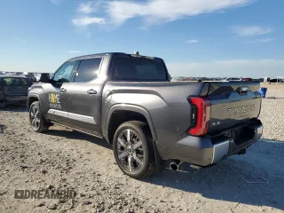 2023 Toyota Tundra Capstone Hybrid with VIN 5TFVC5DB1PX035587, listed as a Copart auction lot 87894665 with 3,056 mi miles and Salvage title. Bid and sale history available at DreamBid. Image 2.