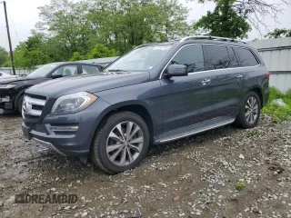 2015 Mercedes-Benz GL 450 z VIN 4JGDF6EE7FA455093, wystawiony jako Copart lot #57187135 z przebiegiem 105 573 mil mil oraz Tytuł czysty. Historia ofert i sprzedaży dostępna na DreamBid. Obrazek 1.