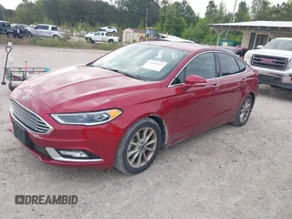 2017 Ford Fusion SE z VIN 3FA6P0HD2HR401046, wystawiony jako IAAI lot #41965539 z przebiegiem 92 664 mil mil oraz . Historia ofert i sprzedaży dostępna na DreamBid. Obrazek 2.