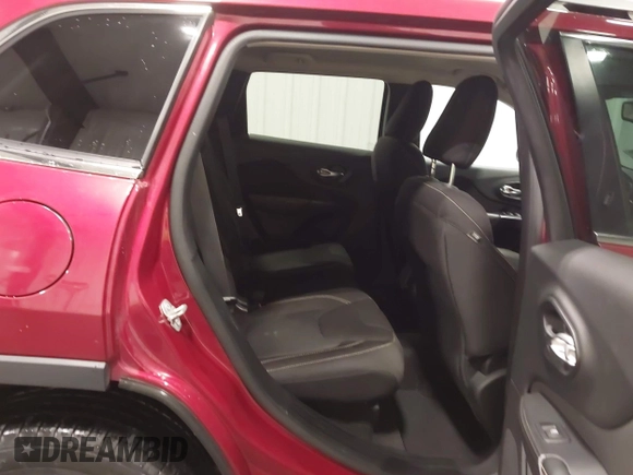2015 Jeep Cherokee Latitude with VIN 1C4PJLCB6FW616477, listed as a IAAI auction lot 41812431 with 131,234 mi miles. Bid and sale history available at carsss.com. Image 8.