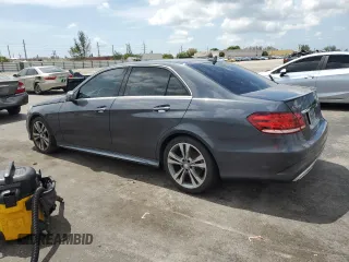 2014 Mercedes-Benz E 350 Sport with VIN WDDHF5KBXEB063203, listed as a Copart auction lot 63674095 with 131,102 mi miles and Clean title. Bid and sale history available at DreamBid. Image 2.