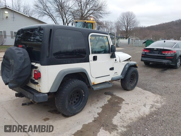 2005 Jeep Wrangler Sport with VIN 1J4FA49S25P352170, listed as a IAAI auction lot 41794958 with 154,304 mi miles. Bid and sale history available at carsss.com. Image 4.