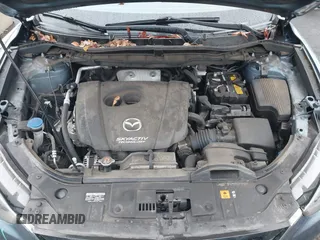 2015 Mazda CX-5 Grand Touring with VIN JM3KE4DY0F0493969, listed as a IAAI auction lot 41581885 with 71,014 mi miles. Bid and sale history available at carsss.com. Image 10.