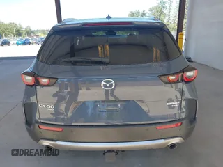 2023 Mazda CX-50 Premium Plus with VIN 7MMVABEY8PN100311, listed as a IAAI auction lot 42626276 with 40,242 mi miles and . Bid and sale history available at DreamBid. Image 16.
