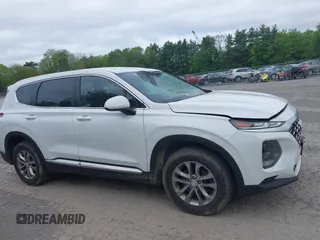 2019 Hyundai Santa Fe SE with VIN 5NMS2CAD9KH117777, listed as a IAAI auction lot 42296811 with 82,188 mi miles and . Bid and sale history available at DreamBid. Image 13.