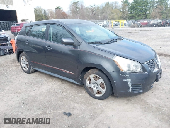 2009 Pontiac Vibe w/1SA with VIN 5Y2SL67859Z404323, listed as a IAAI auction lot 42172647 with 179,874 mi miles. Bid and sale history available at carsss.com. Image 1.
