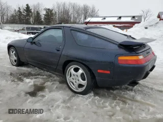 1993 Porsche 928 z VIN WP0AA2929PS815135, wystawiony jako Copart lot #86840514 z przebiegiem 69 263 mil mil oraz Szkody całkowita. Historia ofert i sprzedaży dostępna na DreamBid. Obrazek 2.