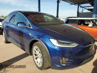2016 Tesla Model X 70D z VIN 5YJXCBE22GF003067, wystawiony jako Copart lot #56051345 z przebiegiem 126 113 mil mil oraz Szkody całkowita. Historia ofert i sprzedaży dostępna na DreamBid. Obrazek 4.