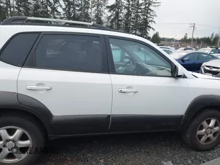 2005 Hyundai Tucson GLS with VIN KM8JN72D75U060416, listed as a IAAI auction lot 41212714 with 173,421 mi miles. Bid and sale history available at carsss.com. Image 13.
