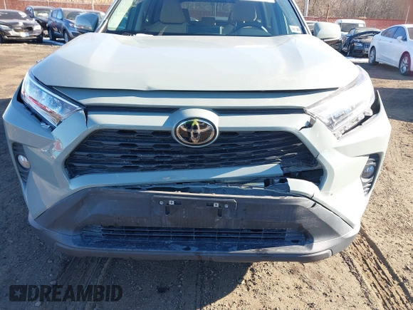 2021 Toyota RAV4 XLE with VIN 2T3W1RFV8MW152785, listed as a IAAI auction lot 41401709 with 55,069 mi miles. Bid and sale history available at carsss.com. Image 6.