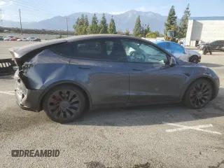 2022 Tesla Model Y Performance with VIN 7SAYGDEF3NF490643, listed as a Copart auction lot 46975825 with 50,792 mi miles and Salvage Title. Bid and sale history available at DreamBid. Image 3.