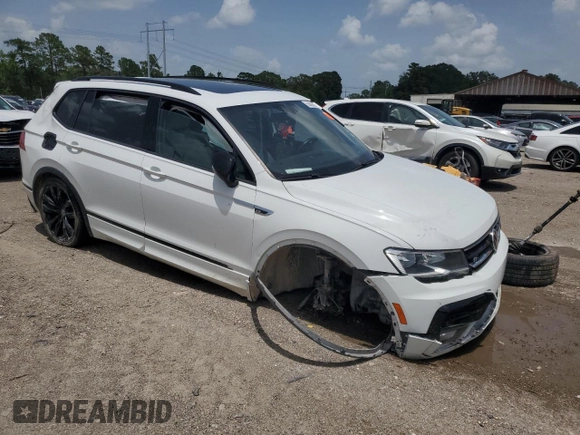 2021 Volkswagen Tiguan SE with VIN 3VV3B7AX7MM130227, listed as a Copart auction lot 63086575 with 80,135 mi miles and Salvage title. Bid and sale history available at DreamBid. Image 4.