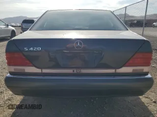 1995 Mercedes-Benz S with VIN WDBGA43E9SA233994, listed as a Copart auction lot 65867264 with 655,674 mi miles and Salvage Title. Bid and sale history available at DreamBid. Image 6.