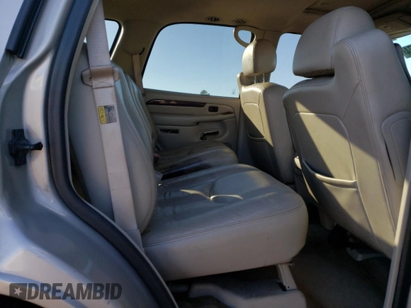 2004 Cadillac Escalade z VIN 1GYEC63T04R107597, wystawiony jako Copart lot #87259974 z przebiegiem Nie podano mil oraz Nie do naprawy • Non repairable. Historia ofert i sprzedaży dostępna na DreamBid. Obrazek 11.